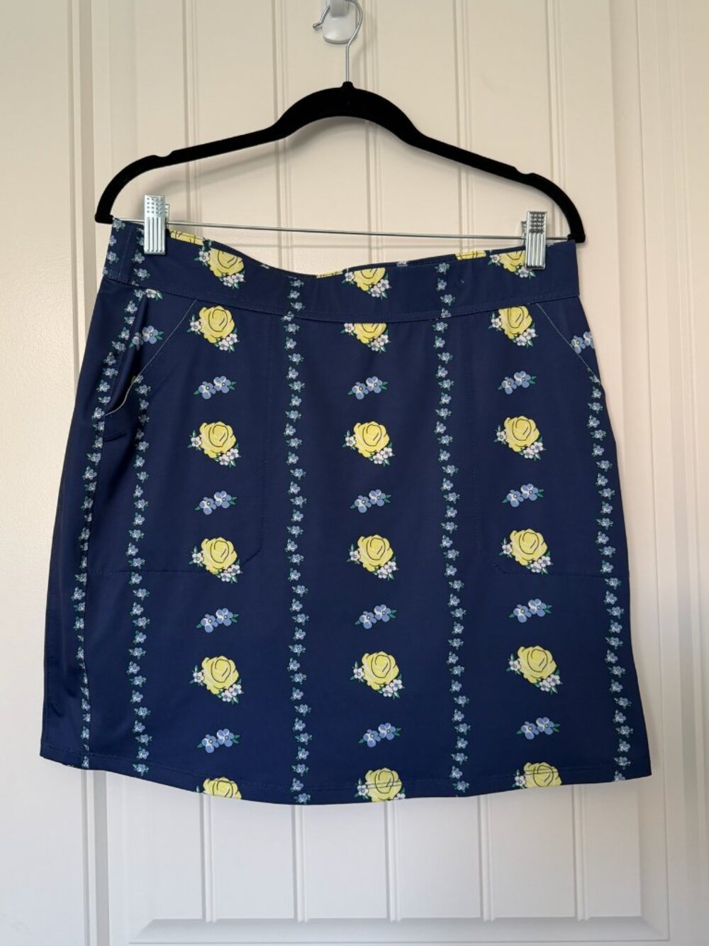 Belyn Key | Navy Floral Golf Skort